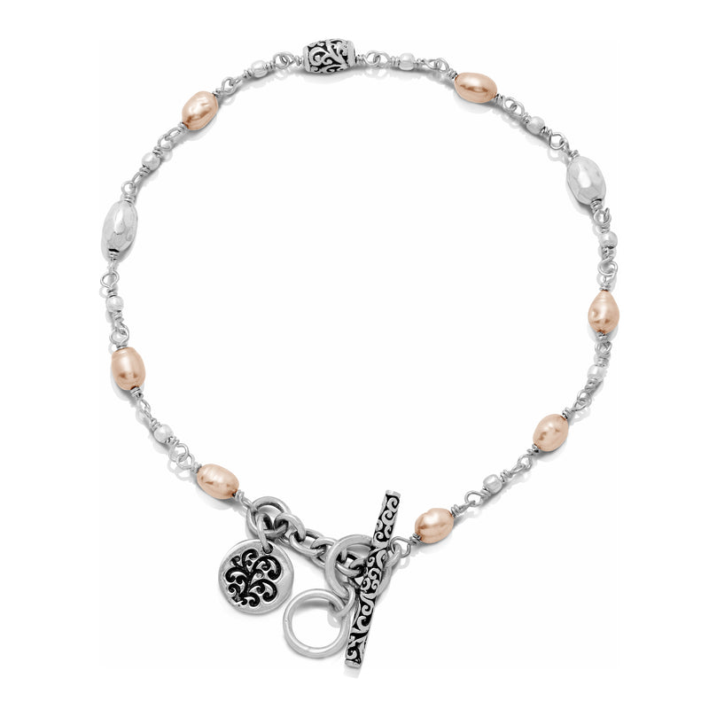 Peach Pearl (4mm) Oval Beads with LH Scroll Barell Single Strand with Scroll Toggle Bracelet